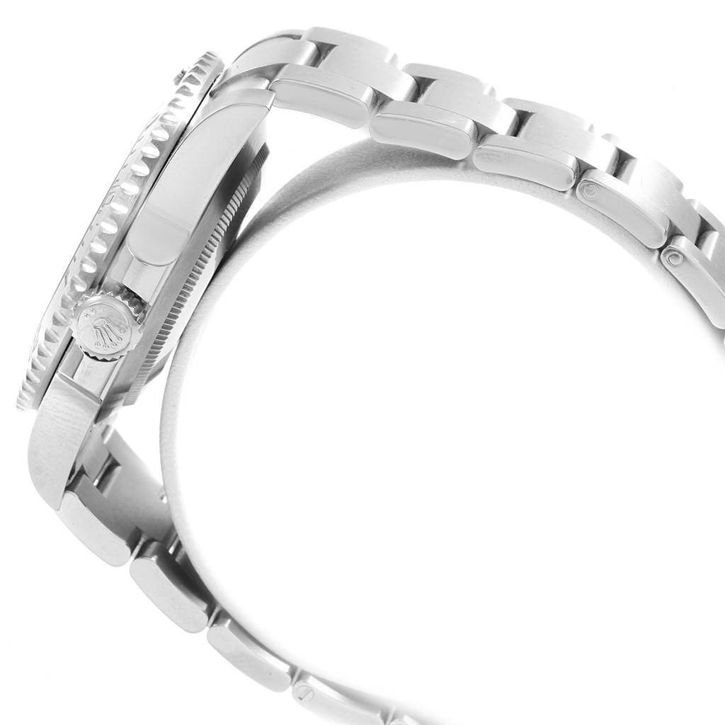 This image shows a side view of the Rolex Submariner 114060 Men's Stainless Steel Black Dial 114060 Men's Stainless Steel Black Dial watch's case, bezel, crown, and part of the bracelet.