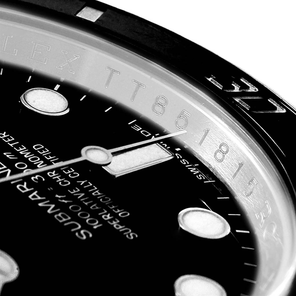 The image shows a close-up of the dial, hour markers, hands, and inner bezel inscription of a Rolex Submariner 114060 Men's Stainless Steel Black Dial 114060 Men's Stainless Steel Black Dial watch.