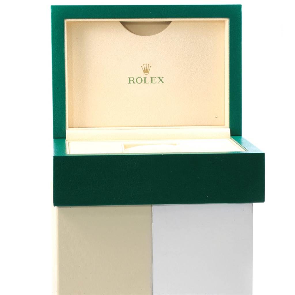 The image shows an open box for a Rolex Submariner 114060 Men's Stainless Steel Black Dial 114060 Men's Stainless Steel Black Dial, featuring the logo inside the lid.