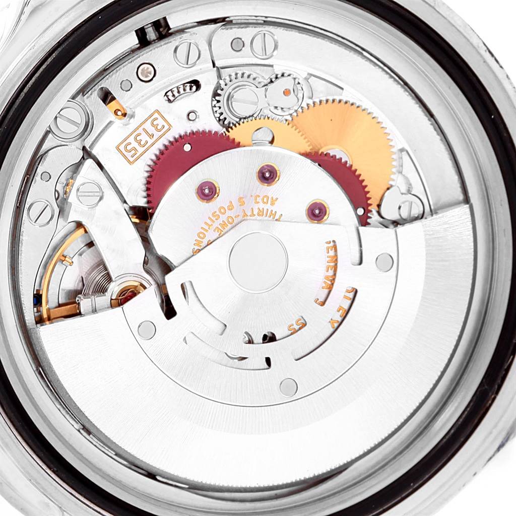 The image shows a close-up of the movement mechanism inside a Rolex Submariner 16610 Men's Stainless Steel Black Dial 16610 Men's Stainless Steel Black Dial watch viewed from the back.
