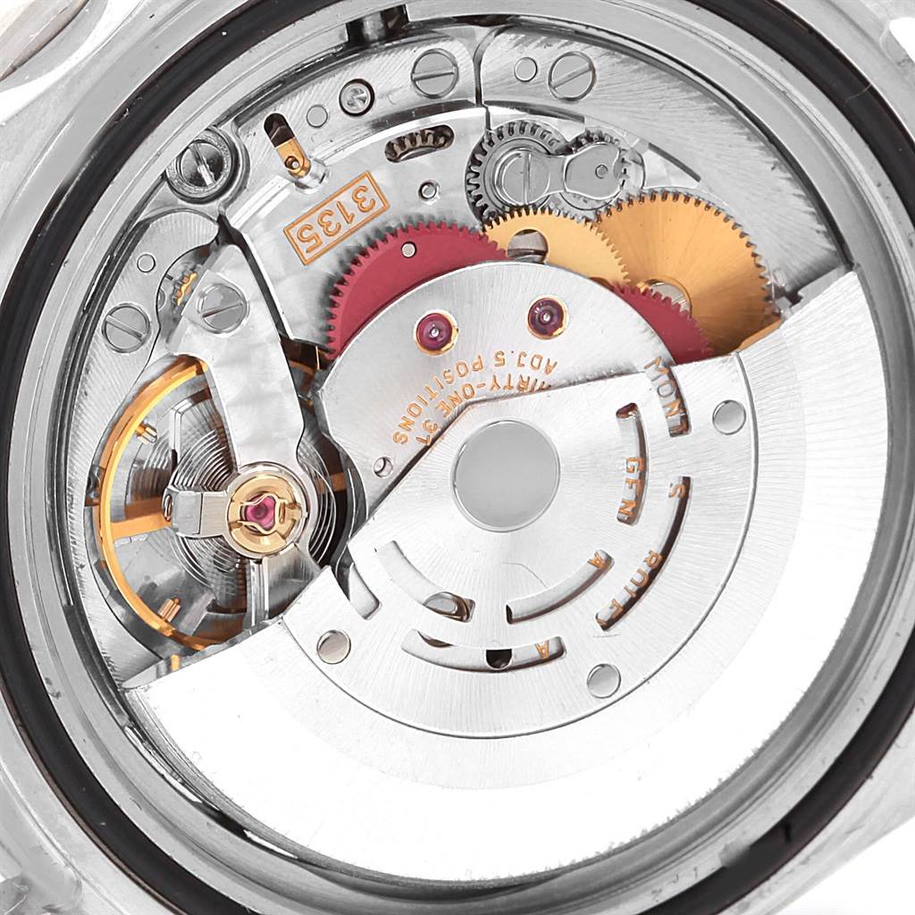 The image shows a close-up of the internal movement mechanism of a Rolex Submariner 16610 Men's Stainless Steel Black Dial 16610 Men's Stainless Steel Black Dial watch.