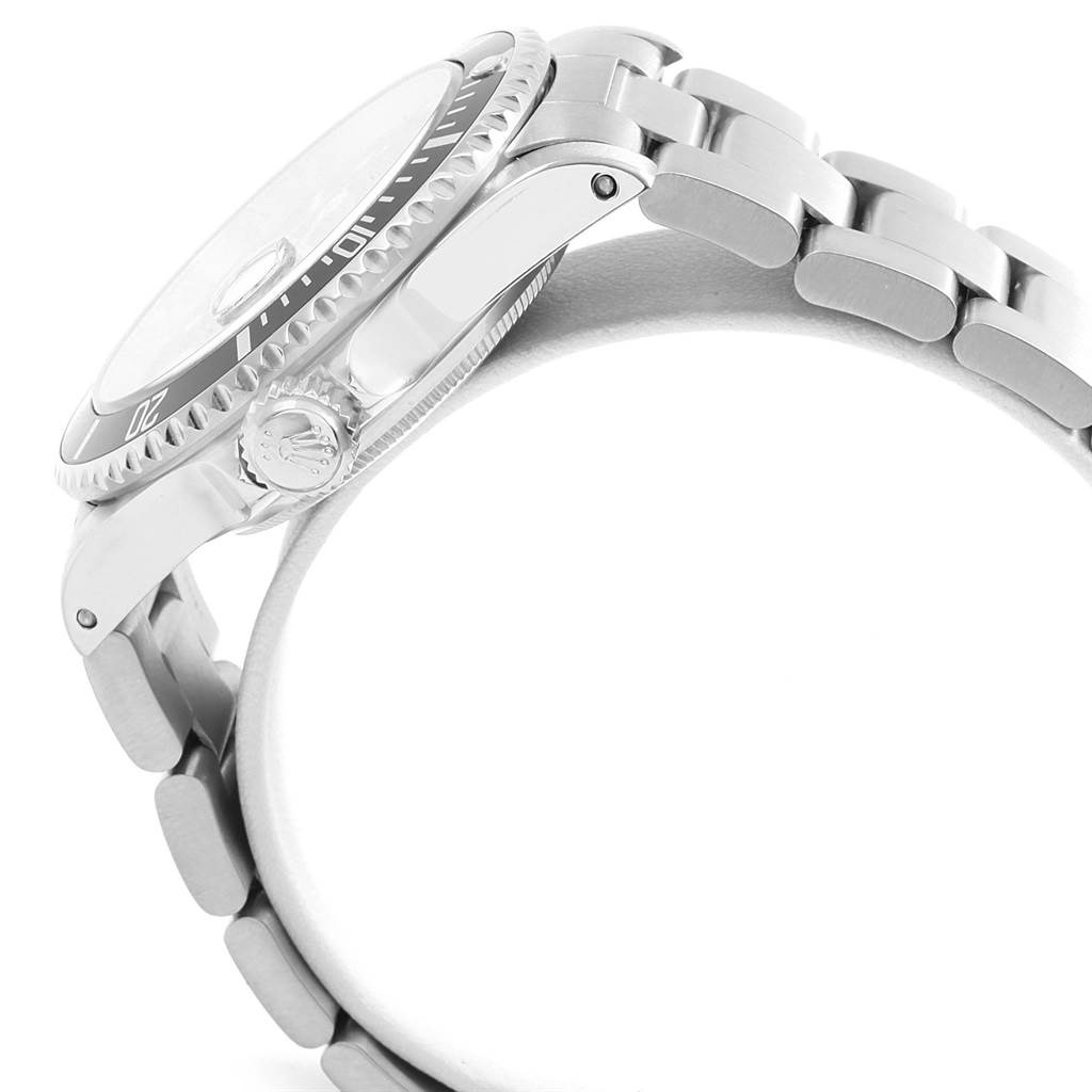 The image shows a side view of a Rolex Submariner 16610 Men's Stainless Steel Black Dial 16610 Men's Stainless Steel Black Dial watch focusing on the case, bezel, crown, and part of the bracelet.