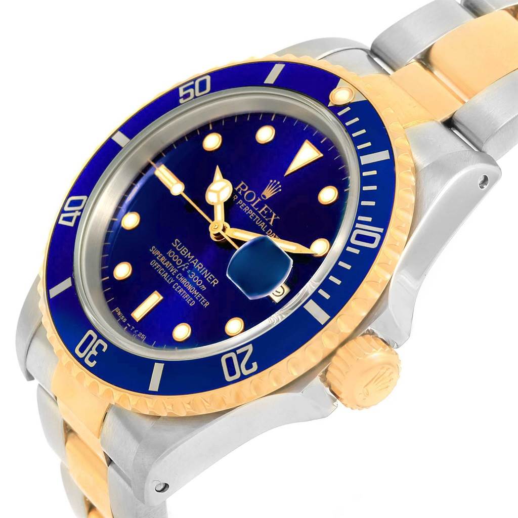 This Rolex Submariner 16613 Men's Steel and Gold (two tone) Blue Dial 16613 Men's Steel and Gold (two tone) Blue Dial watch is shown at an angled close-up, highlighting the bezel, dial, crown, and part of the bracelet.
