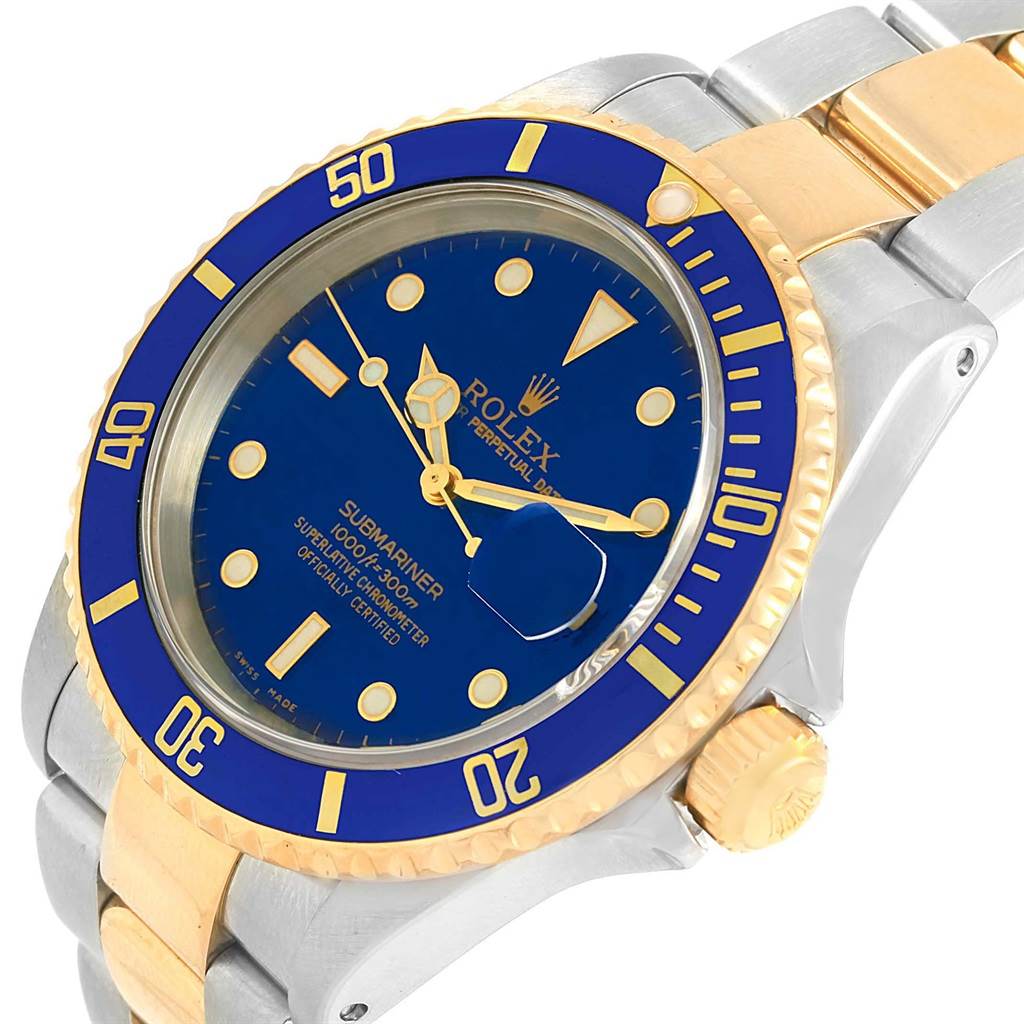 This image shows a close-up angle of the Rolex Submariner 16613 Men's Steel and Gold (two tone) Blue Dial 16613 Men's Steel and Gold (two tone) Blue Dial, highlighting its blue dial, gold bezel, and two-tone bracelet.