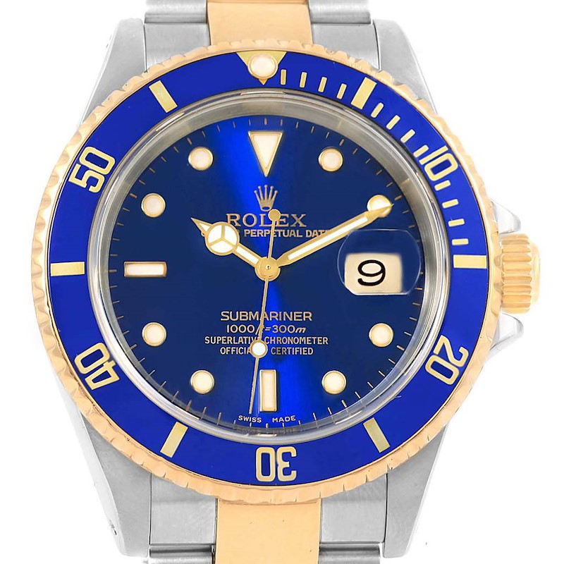 The image shows a front view of a Rolex Submariner 16613 Men's Steel and Gold (two tone) Blue Dial 16613 Men's Steel and Gold (two tone) Blue Dial watch with a blue dial and bezel, featuring a date display.