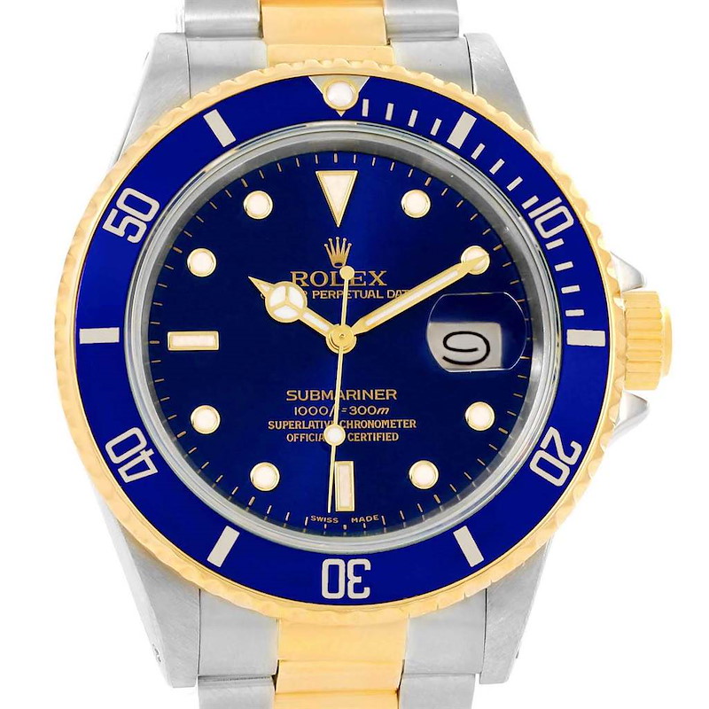The image shows a frontal view of a Rolex Submariner 16803 Men's Steel and Gold (two tone) Blue Dial 16803 Men's Steel and Gold (two tone) Blue Dial watch, featuring a blue dial, a gold bezel, and a two-tone metal bracelet.