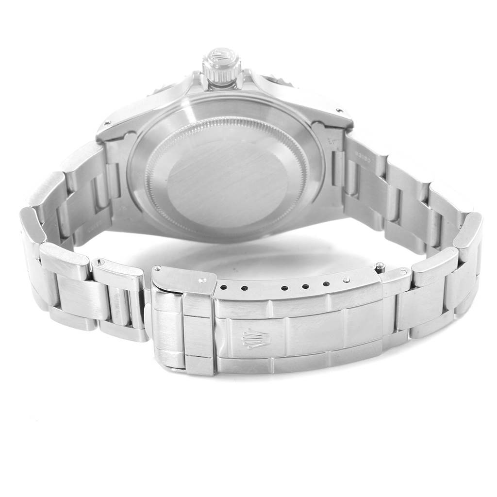 The image shows the back case and bracelet clasp of a Rolex Submariner 14060 Men's Stainless Steel Black Dial 14060 Men's Stainless Steel Black Dial watch.