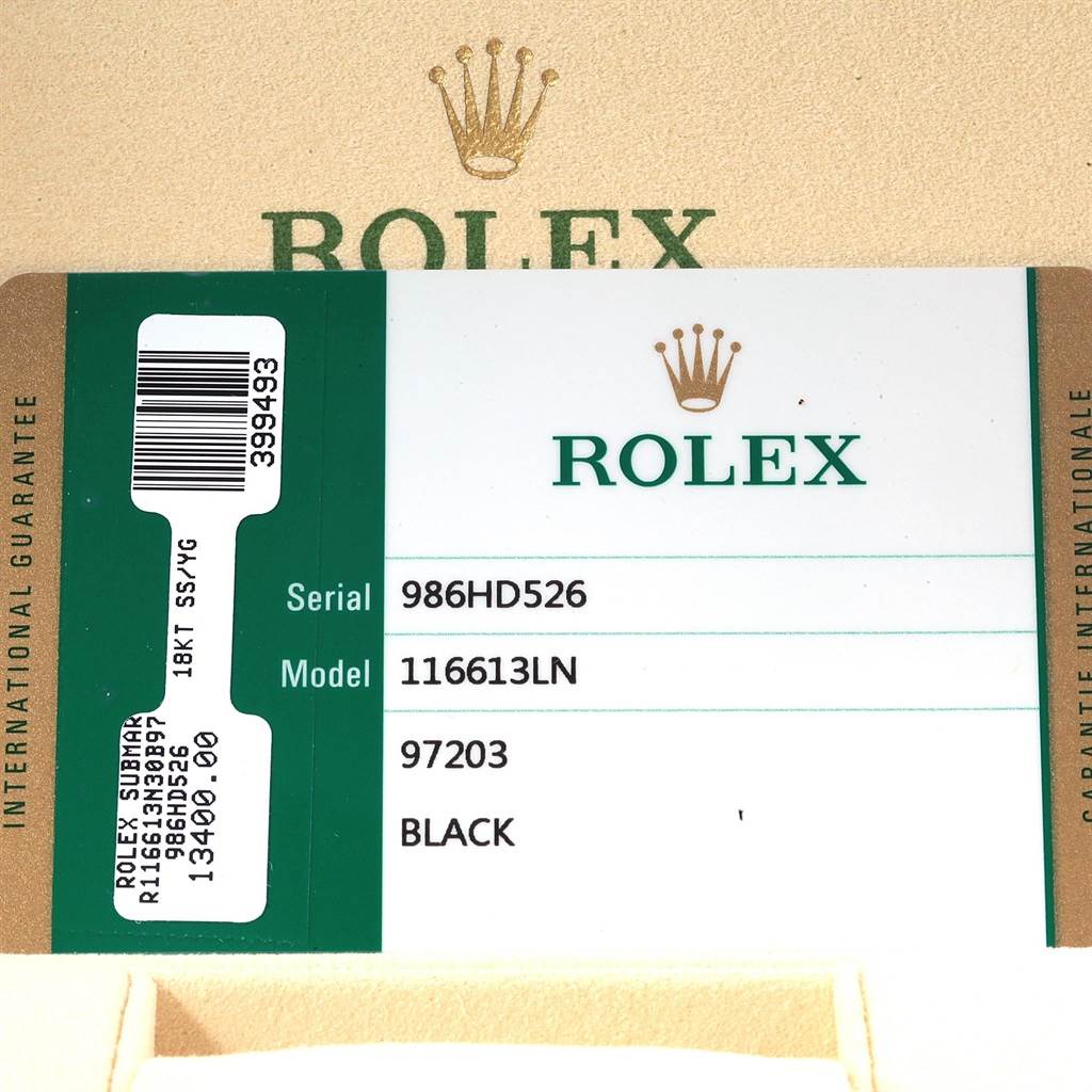 The image shows the guarantee card for a Rolex Submariner 116613 Men's Steel and Gold (two tone) Black Dial 116613 Men's Steel and Gold (two tone) Black Dial model 116613LN with serial number 986HD526.