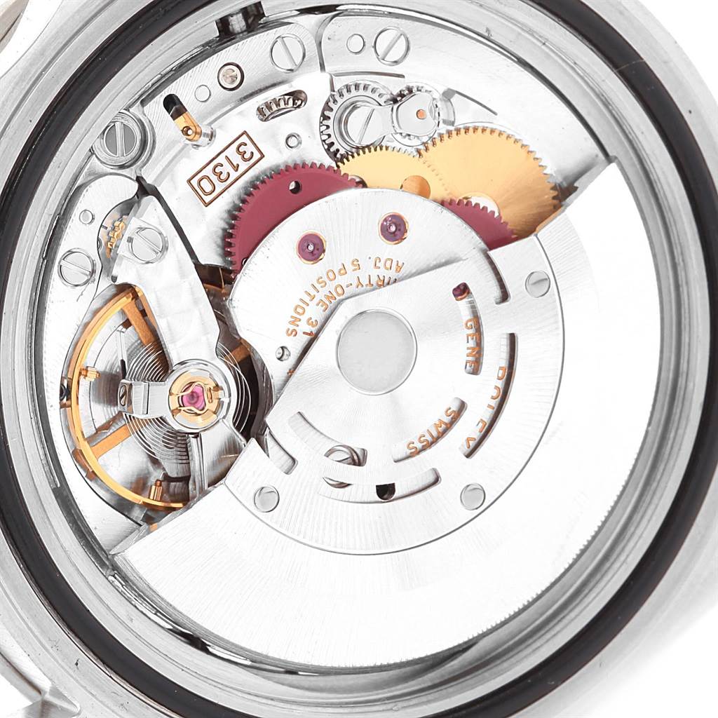 This image shows the internal mechanical movement and components of a Rolex Submariner 14060 Men's Stainless Steel Black Dial 14060 Men's Stainless Steel Black Dial watch from a top-down view.