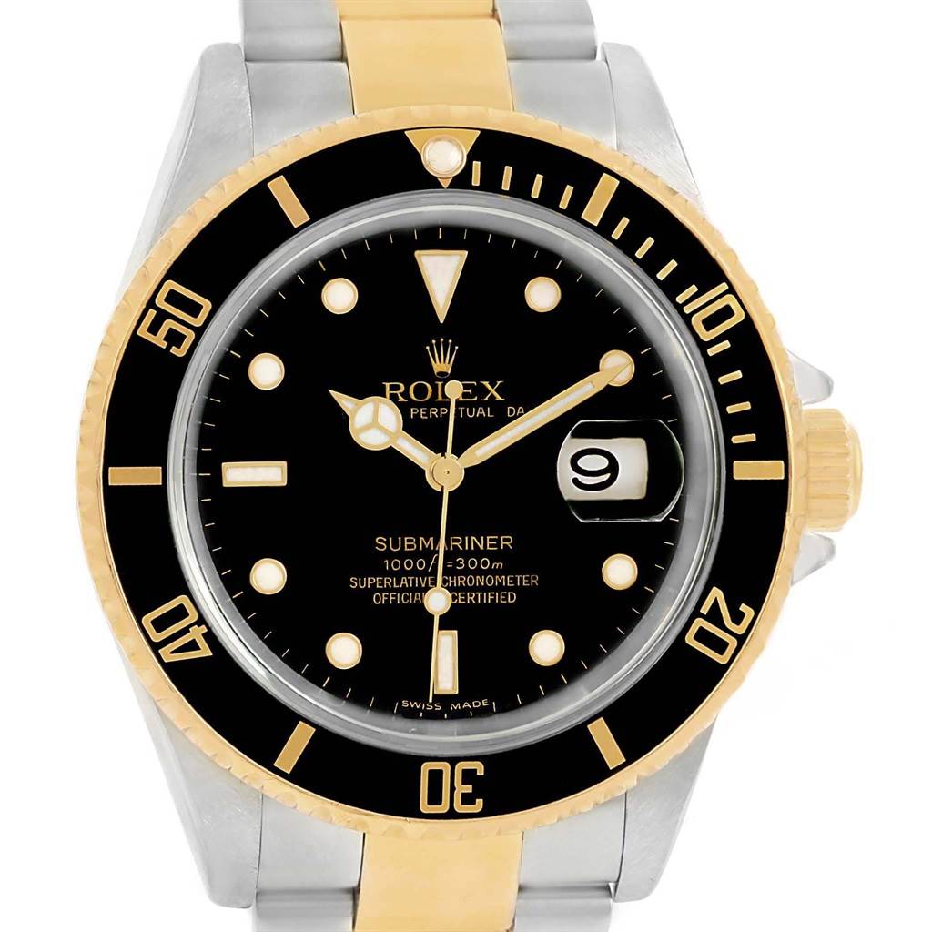 The image shows a front view of a Rolex Submariner 16613 Men's Steel and Gold (two tone) Black Dial 16613 Men's Steel and Gold (two tone) Black Dial watch featuring its bezel, dial, hour markers, hands, date window, and two-tone bracelet.