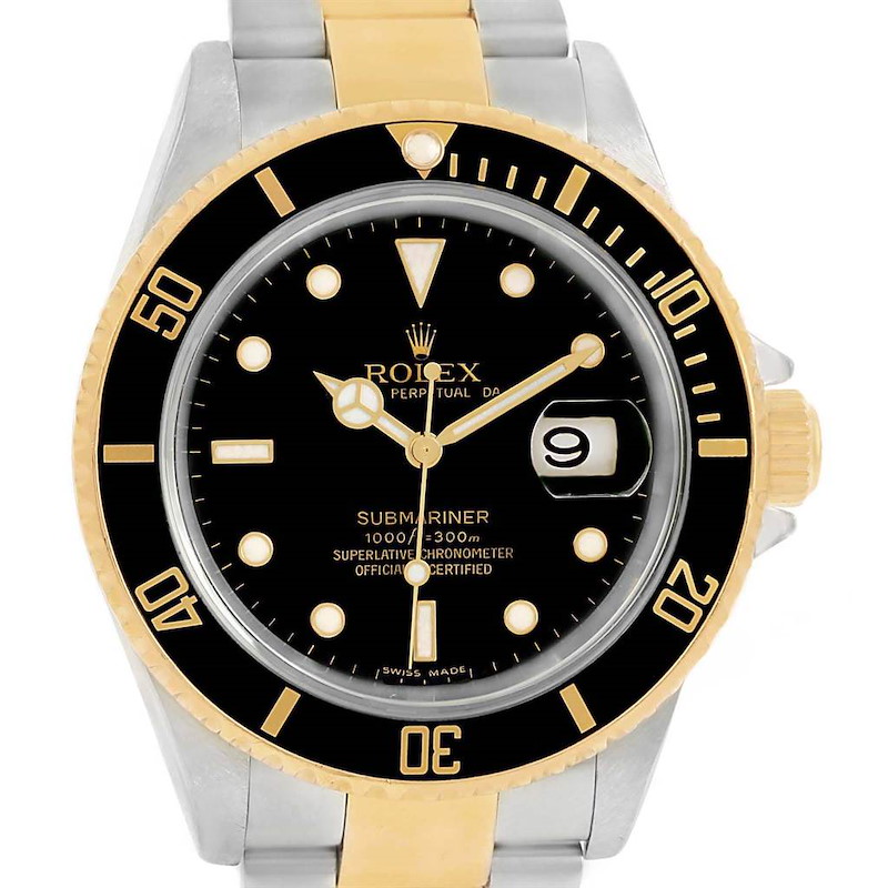 The image shows a front view of a Rolex Submariner 16613 Men's Steel and Gold (two tone) Black Dial 16613 Men's Steel and Gold (two tone) Black Dial watch featuring its bezel, dial, hour markers, hands, date window, and two-tone bracelet.