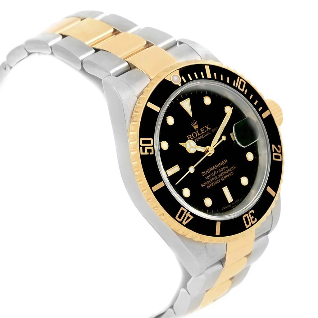 The Rolex Submariner 16613 Men's Steel and Gold (two tone) Black Dial 16613 Men's Steel and Gold (two tone) Black Dial watch is shown at a slight angle, highlighting its black dial, bezel, and two-tone bracelet.