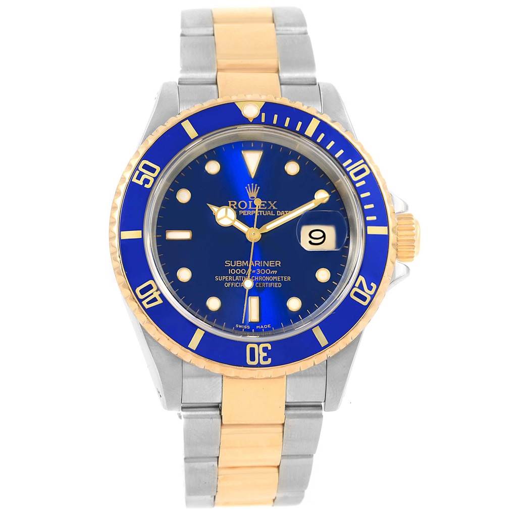 This image shows a frontal view of a Rolex Submariner 16613 Men's Steel and Gold (two tone) Blue Dial 16613 Men's Steel and Gold (two tone) Blue Dial watch featuring a blue dial, yellow gold and silver band, bezel, and date window.