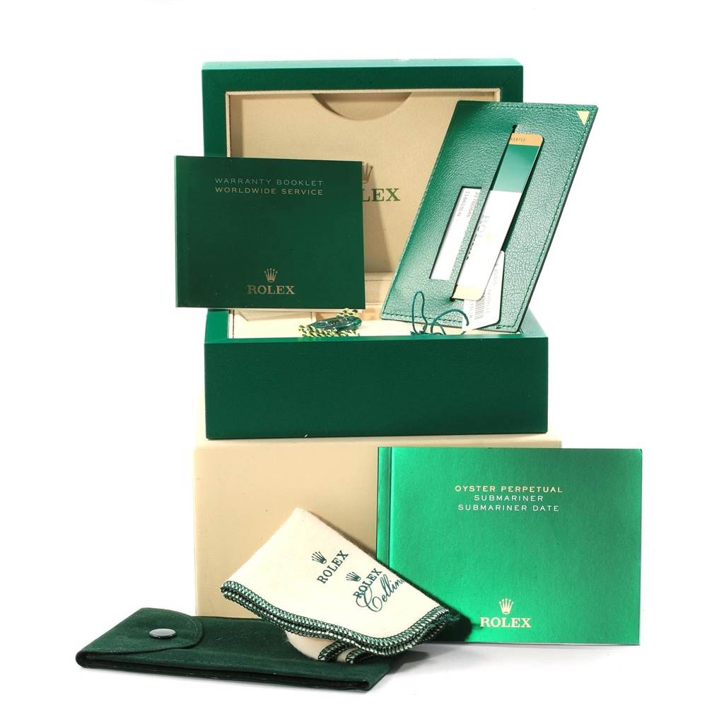 The image shows accessories for the Rolex Submariner 116610 Men's Stainless Steel Black Dial 116610 Men's Stainless Steel Black Dial model, including a warranty booklet, cleaning cloth, case, and various manuals.