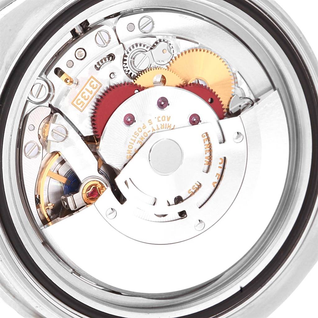 This image shows the intricate internal mechanism of the Rolex Submariner 116610 Men's Stainless Steel Black Dial 116610 Men's Stainless Steel Black Dial watch from a top-view angle.