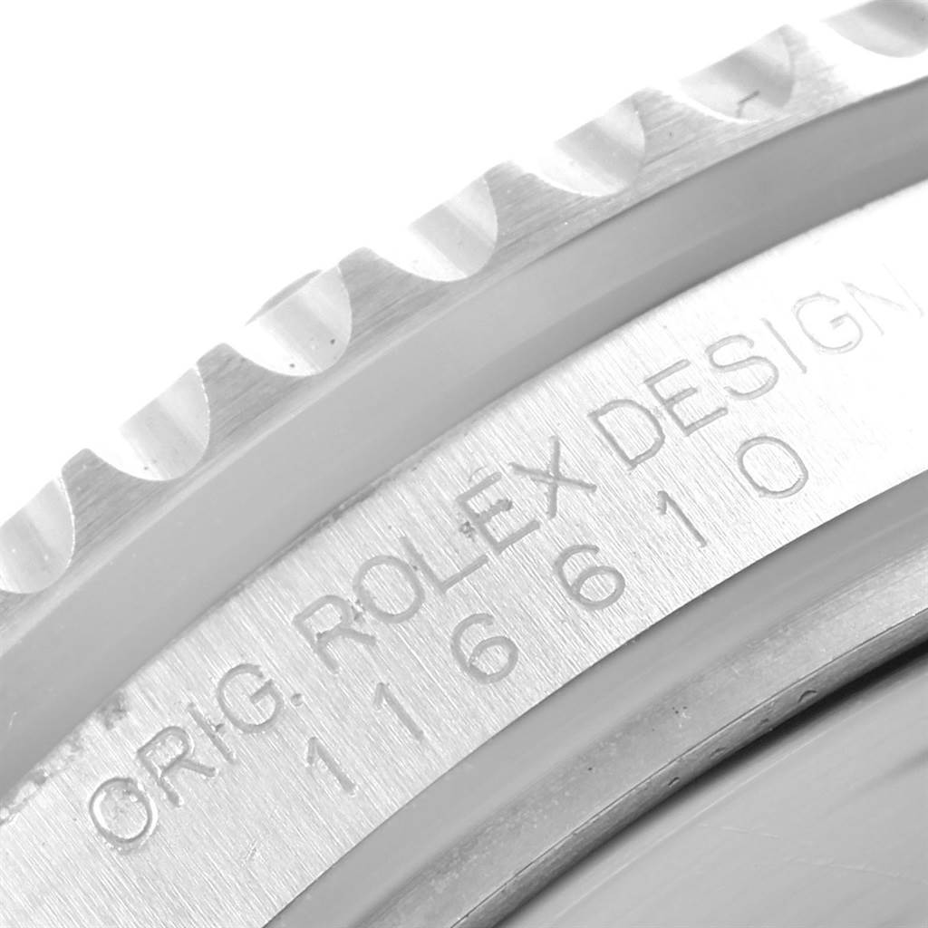 This close-up image captures the bezel and engraved casing of the Rolex Submariner 116610 Men's Stainless Steel Black Dial 116610 Men's Stainless Steel Black Dial watch.