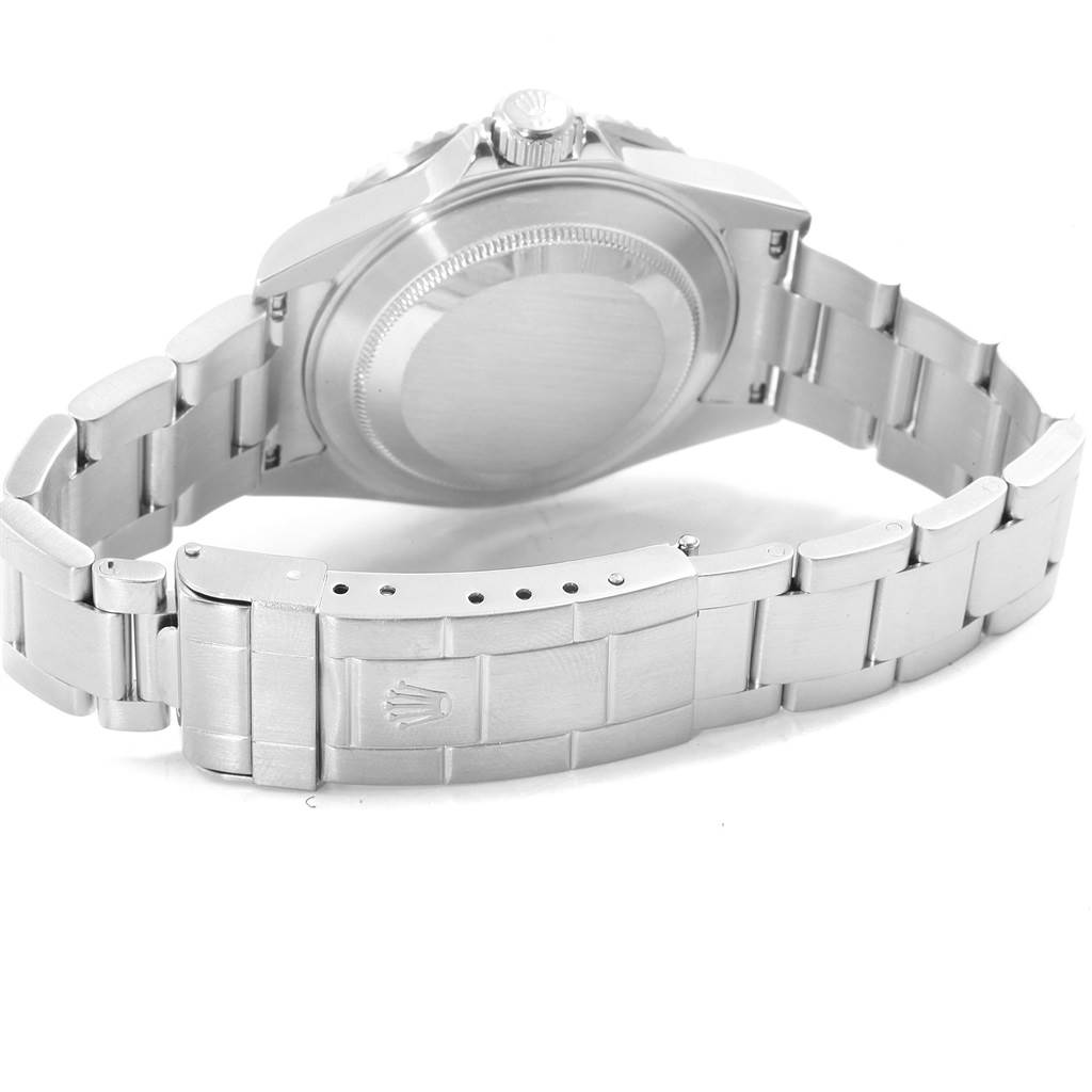 The image shows the back view of a Rolex Submariner 16610 Men's Stainless Steel Black Dial 16610 Men's Stainless Steel Black Dial watch, highlighting the case back and bracelet clasp.