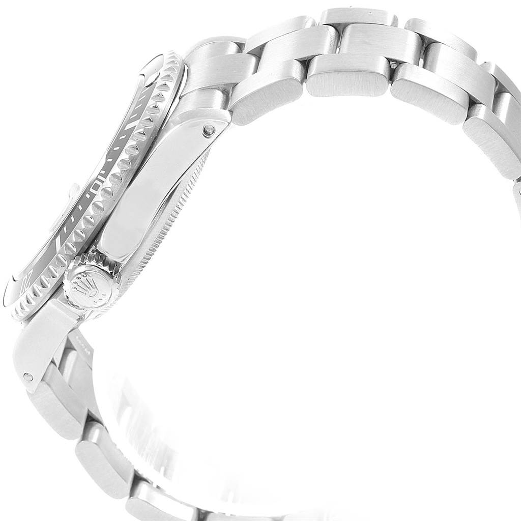 The image shows a side profile of the Rolex Submariner 16610 Men's Stainless Steel Black Dial 16610 Men's Stainless Steel Black Dial watch, focusing on its crown, bezel, and bracelet links.