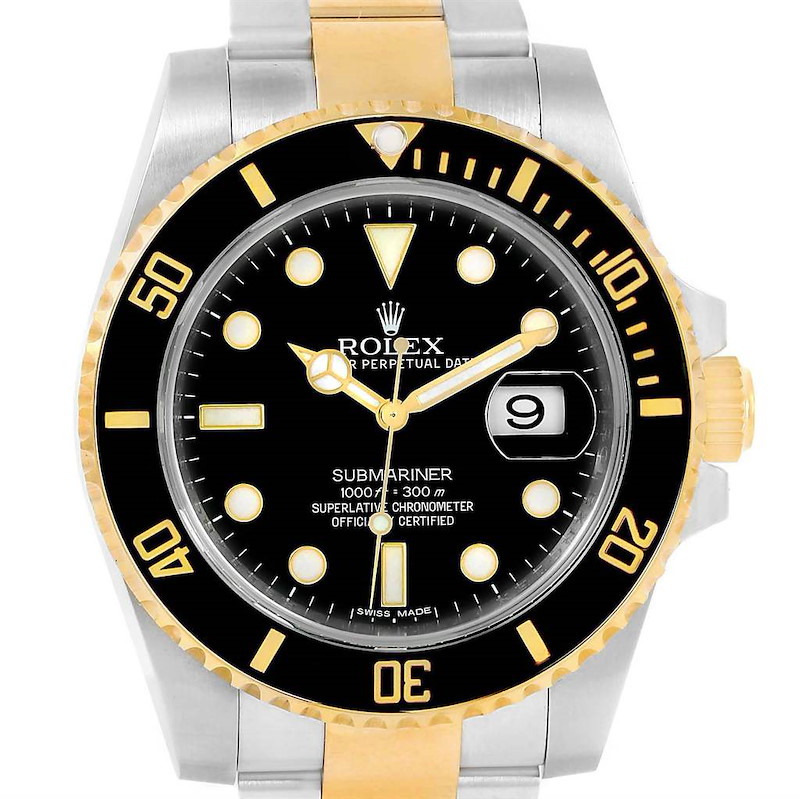 The image shows a front view of a Rolex Submariner 116613 Men's Steel and Gold (two tone) Black Dial 116613 Men's Steel and Gold (two tone) Black Dial watch, highlighting the dial, bezel, and part of the bracelet.