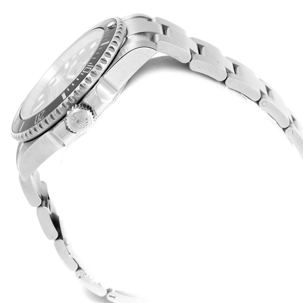 The image shows a side view of the Rolex Submariner 114060 Men's Stainless Steel Black Dial 114060 Men's Stainless Steel Black Dial watch, highlighting its crown, bezel, and bracelet.