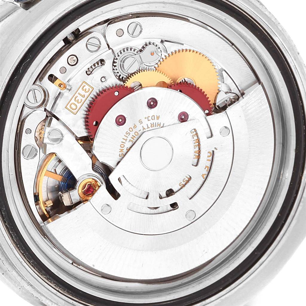 This image shows the internal mechanical movement of a Rolex Submariner 114060 Men's Stainless Steel Black Dial 114060 Men's Stainless Steel Black Dial watch from a back angle.