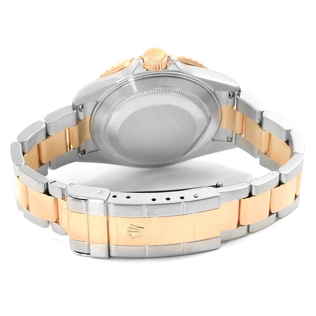 This image shows the back case and bracelet of a Rolex Submariner 16613 Men's Steel and Gold (two tone) Black Dial 16613 Men's Steel and Gold (two tone) Black Dial watch from a rear angle.