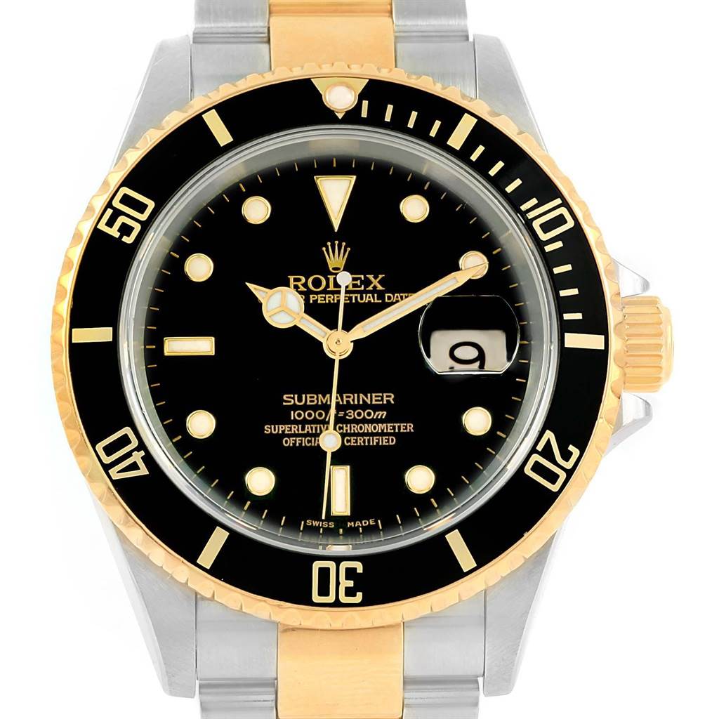 This image shows a frontal view of a Rolex Submariner 16613 Men's Steel and Gold (two tone) Black Dial 16613 Men's Steel and Gold (two tone) Black Dial watch, highlighting its black dial, gold accents, and date window.