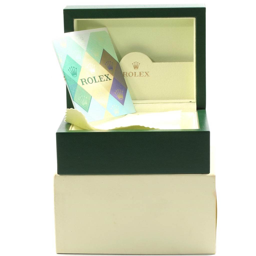 The image shows the open box and warranty card of a Rolex Submariner 16613 Men's Steel and Gold (two tone) Blue Dial 16613 Men's Steel and Gold (two tone) Blue Dial watch.