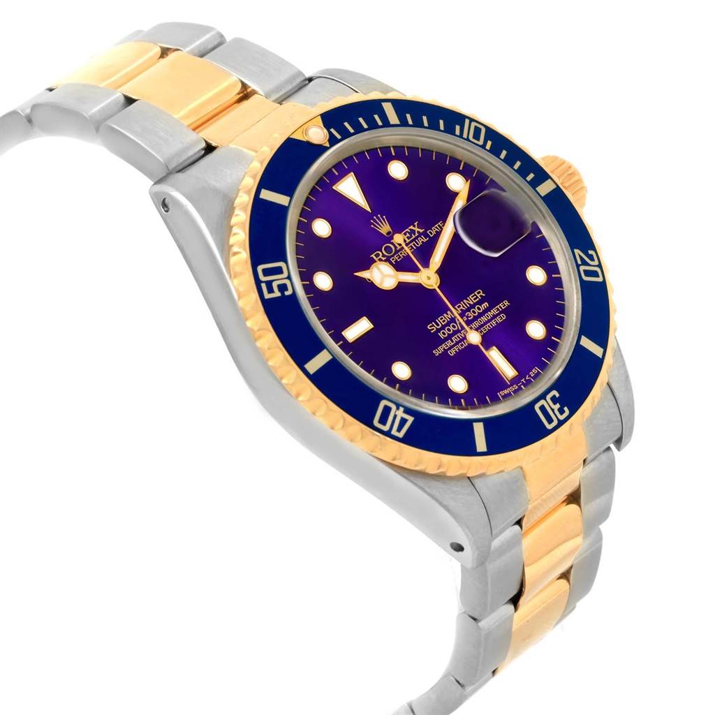 The image shows a Rolex Submariner 16613 Men's Steel and Gold (two tone) Blue Dial 16613 Men's Steel and Gold (two tone) Blue Dial watch angled to display the face, bezel, crown, and part of the two-tone bracelet.