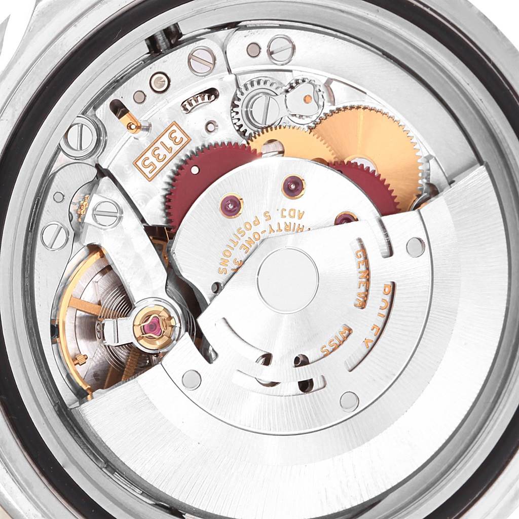 This image shows the internal mechanism and movement of the Rolex Submariner 16610 Men's Stainless Steel Black Dial 16610 Men's Stainless Steel Black Dial watch from a rear angle.