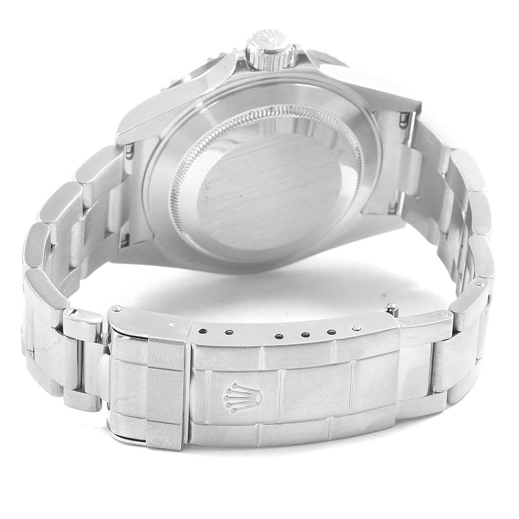 The image shows the back view of a Rolex Submariner 16610 Men's Stainless Steel Black Dial 16610 Men's Stainless Steel Black Dial watch, highlighting its case, bracelet, clasp, and crown.