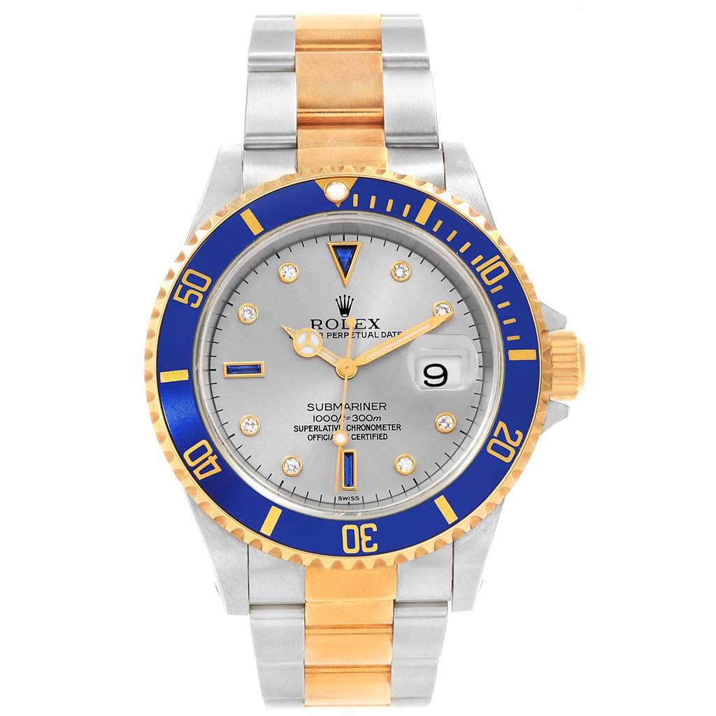 The Rolex Submariner 16613 Men's Steel and Gold (two tone) Grey Dial 16613 Men's Steel and Gold (two tone) Grey Dial watch is shown from the front, featuring the face, bezel, and part of the bracelet.