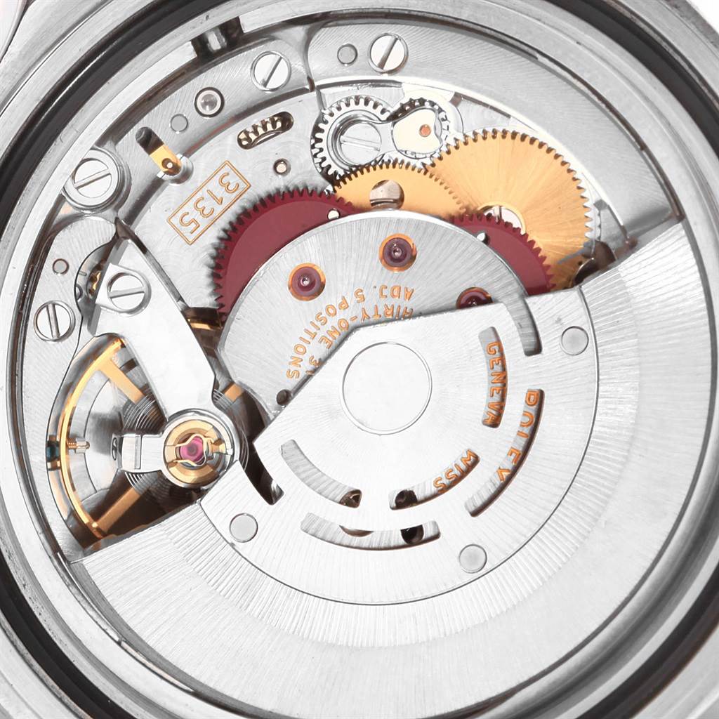 The image shows the internal movement and gears of a Rolex Submariner 16610 Men's Stainless Steel Silver Dial 16610 Men's Stainless Steel Silver Dial watch viewed from the back.
