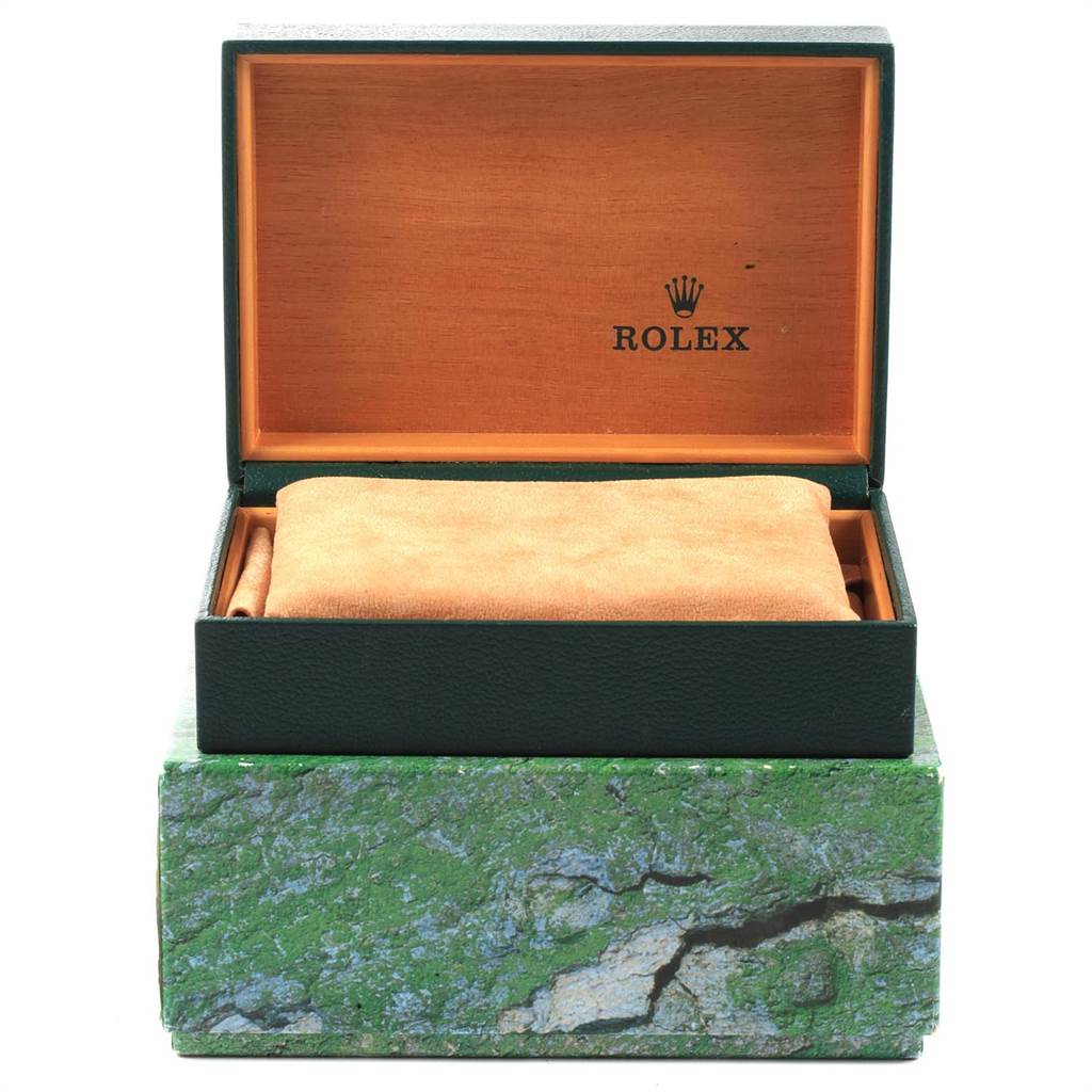 This image shows an empty Rolex watch box for the Submariner model with its lid open.
