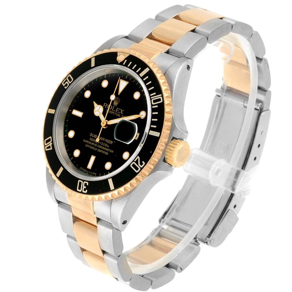 The image shows a Rolex Submariner 16613 Men's Steel and Gold (two tone) Black Dial 16613 Men's Steel and Gold (two tone) Black Dial watch at a three-quarter angle, highlighting its black dial, bezel, and two-tone metal bracelet.