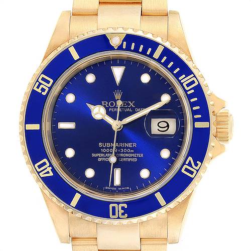 The image shows a close-up of the Rolex Submariner 16618 Men's Yellow Gold Blue Dial 16618 Men's Yellow Gold Blue Dial watch, highlighting the dial, bezel, and part of the bracelet.