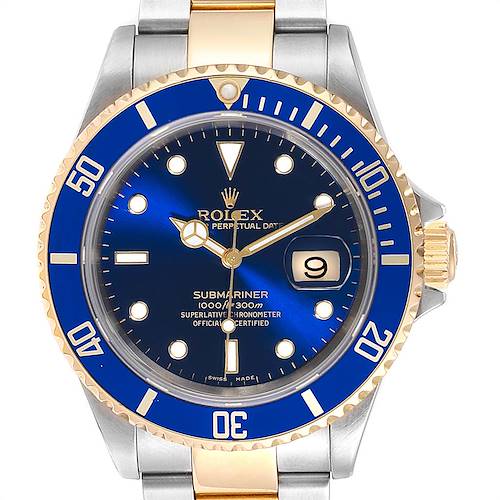 The image shows a front view of the Rolex Submariner 16613 Men's Steel and Gold (two tone) Blue Dial 16613 Men's Steel and Gold (two tone) Blue Dial watch, highlighting its blue dial, date display, and two-tone bracelet.