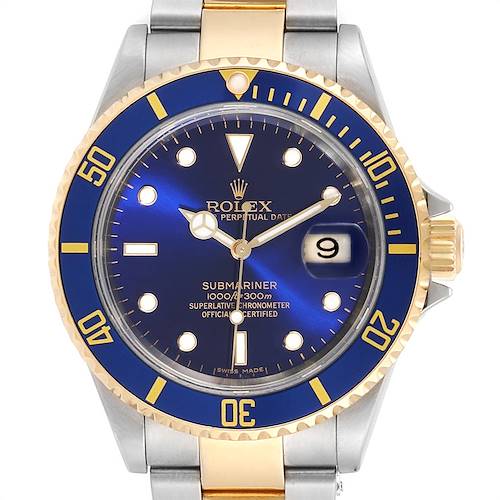 This image shows the face of a Rolex Submariner 16613 Men's Steel and Gold (two tone) Blue Dial 16613 Men's Steel and Gold (two tone) Blue Dial watch, highlighting the dial, bezel, and part of the bracelet and crown.