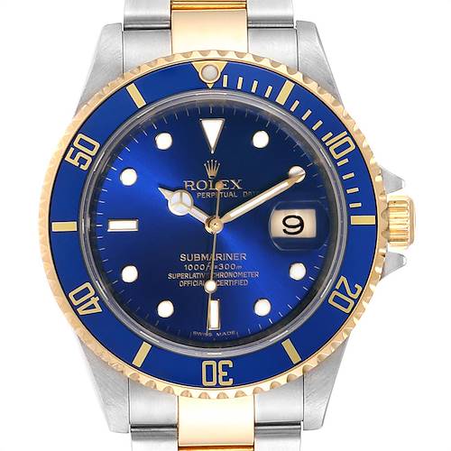 This image shows a Rolex Submariner 16613 Men's Steel and Gold (two tone) Blue Dial 16613 Men's Steel and Gold (two tone) Blue Dial watch from a top view, highlighting its blue dial, date window, and two-tone metal bracelet.