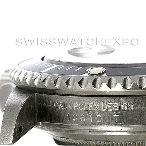 The image shows a close-up side view of the bezel, case, and lugs of a Rolex Submariner 16610T Men's Stainless Steel Black Dial 16610T Men's Stainless Steel Black Dial, highlighting the engravings.