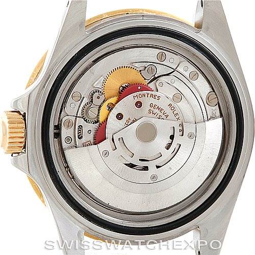 This image shows the back case of a Rolex Submariner 16613 Men's Steel and Gold (two tone) Blue Dial 16613 Men's Steel and Gold (two tone) Blue Dial watch, displaying its internal mechanical movement.