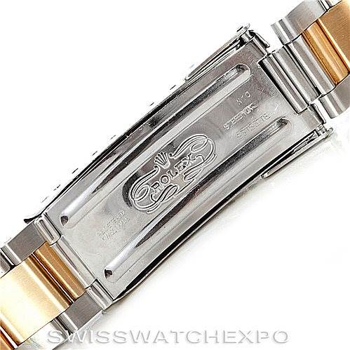 This image shows the underside of the clasp and part of the bracelet for the Rolex Submariner 16613 Men's Steel and Gold (two tone) Blue Dial 16613 Men's Steel and Gold (two tone) Blue Dial watch.