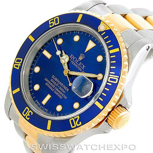 This image shows a close-up of a Rolex Submariner 16613 Men's Steel and Gold (two tone) Blue Dial 16613 Men's Steel and Gold (two tone) Blue Dial watch, highlighting the face, bezel, and part of the bracelet.