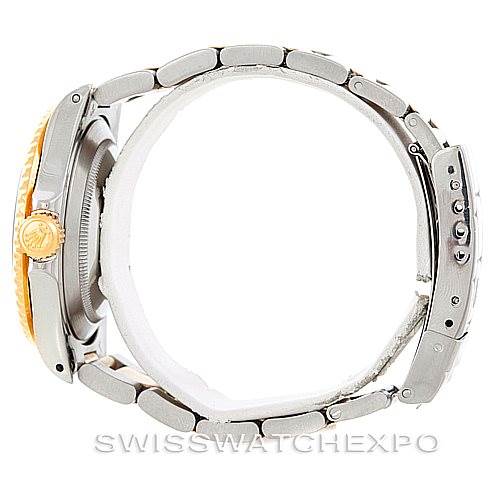 The image shows a side view of a Rolex Submariner 16613 Men's Steel and Gold (two tone) Blue Dial 16613 Men's Steel and Gold (two tone) Blue Dial watch, highlighting its bracelet and side profile.