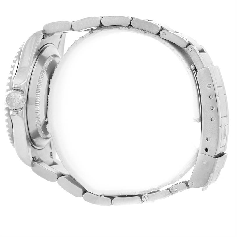 This image shows a side view of the Rolex Submariner 16610 Men's Stainless Steel Black Dial 16610 Men's Stainless Steel Black Dial, focusing on the crown, case, and bracelet.