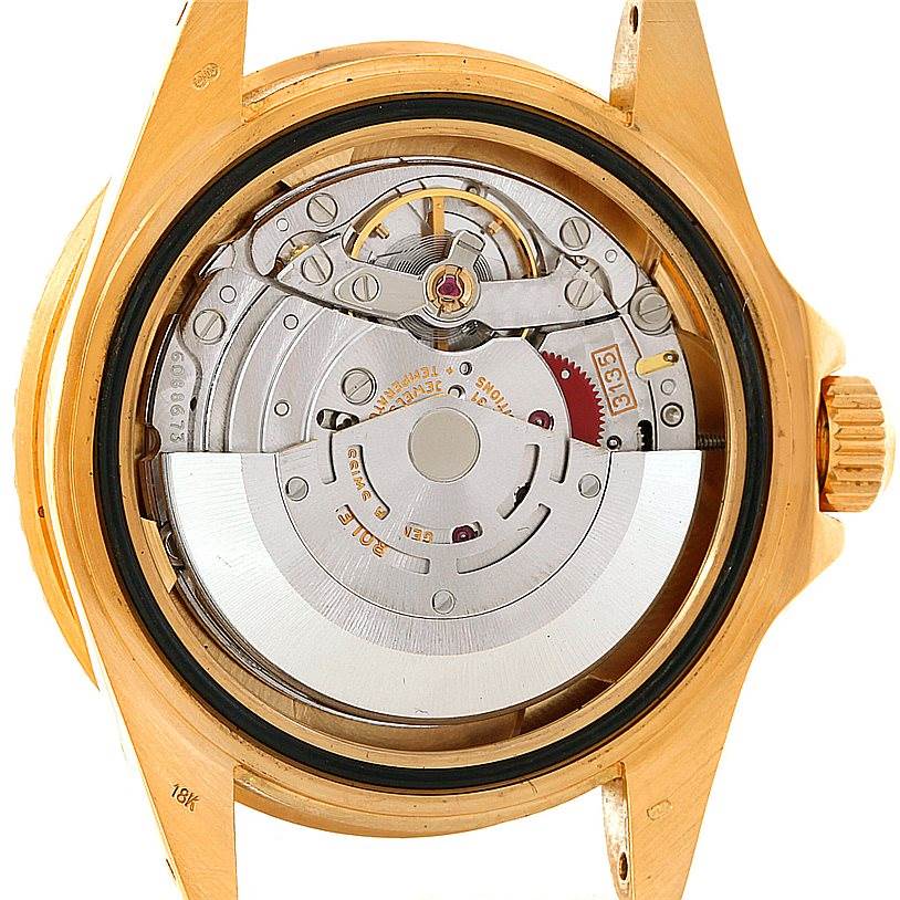 The image shows the internal movement and mechanisms of a Rolex Submariner 16618 Men's Yellow Gold Blue Dial 16618 Men's Yellow Gold Blue Dial watch viewed from the back.
