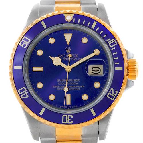 The image shows the face and bezel of a Rolex Submariner 16803 Men's Steel and Gold (two tone) Blue Dial 16803 Men's Steel and Gold (two tone) Blue Dial, featuring a blue dial and a two-tone bracelet.