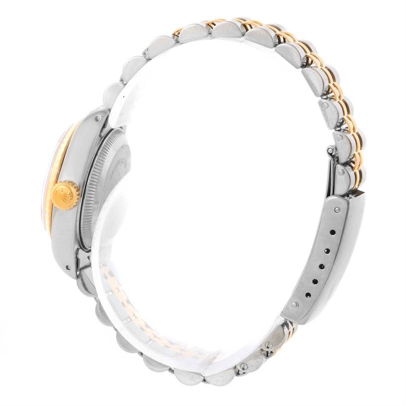 The image shows the side view of a Rolex Datejust 69173 Women's Stainless Steel Blue Dial 69173 Women's Stainless Steel Blue Dial watch, focusing on the crown and the link bracelet.