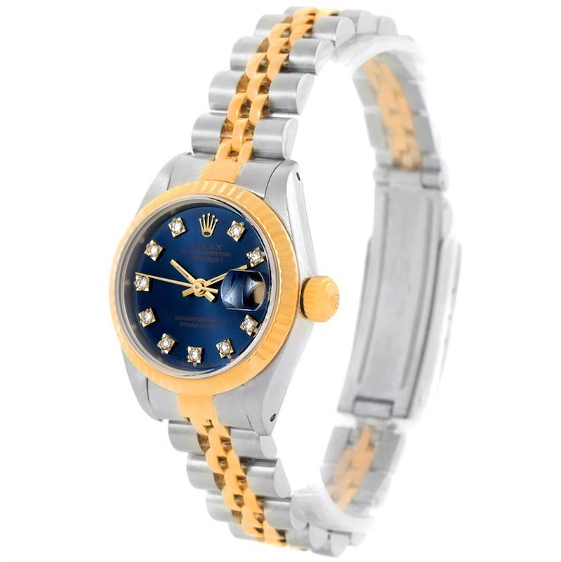 This image shows a Rolex Datejust 69173 Women's Stainless Steel Blue Dial 69173 Women's Stainless Steel Blue Dial watch at a slight angle, highlighting its blue dial, gold bezel, and two-tone bracelet.