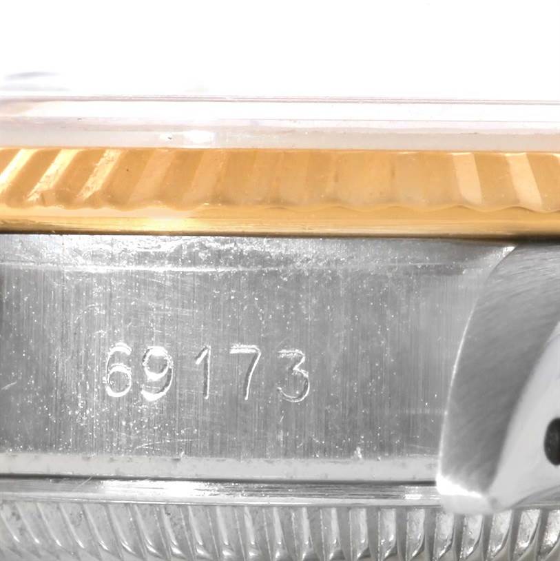 The image shows a close-up of the case side, bezel, and model number of the Rolex Datejust 69173 Women's Stainless Steel Blue Dial 69173 Women's Stainless Steel Blue Dial 69173.